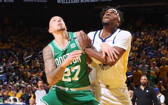 SAN FRANCISCO, CA - JUNE 5: Daniel Theis #27 of the Boston Celtics and Kevon Looney #5 of the Golden State Warriors look for the rebound during Game Two of the 2022 NBA Finals on June 5, 2022 at Chase Center in San Francisco, California. NOTE TO USER: User expressly acknowledges and agrees that, by downloading and or using this photograph, user is consenting to the terms and conditions of Getty Images License Agreement. Mandatory Copyright Notice: Copyright 2022 NBAE (Photo by Nathaniel S. Butler/NBAE via Getty Images)