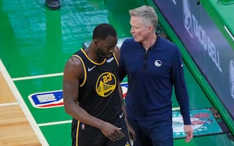 BOSTON, MA - JUNE 10: Draymond Green #23 and Steve Kerr of the Golden State Warriors talk against the Boston Celtics during Game Four of the 2022 NBA Finals on June 10, 2022 at TD Garden in Boston, Massachusetts. NOTE TO USER: User expressly acknowledges and agrees that, by downloading and or using this photograph, user is consenting to the terms and conditions of Getty Images License Agreement. Mandatory Copyright Notice: Copyright 2022 NBAE (Photo by Mark Blinch/NBAE via Getty Images)
