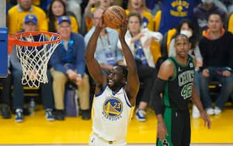SAN FRANCISCO, CALIFORNIA - JUNE 13: Draymond Green #23 of the Golden State Warriors dunks the ball during the first quarter against Al Horford #42 of the Boston Celtics in Game Five of the 2022 NBA Finals at Chase Center on June 13, 2022 in San Francisco, California. NOTE TO USER: User expressly acknowledges and agrees that, by downloading and/or using this photograph, User is consenting to the terms and conditions of the Getty Images License Agreement. (Photo by Thearon W. Henderson/Getty Images)