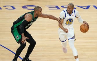 SAN FRANCISCO, CALIFORNIA - JUNE 13: Andre Iguodala #9 of the Golden State Warriors drives past Al Horford #42 of the Boston Celtics during the second quarter in Game Five of the 2022 NBA Finals at Chase Center on June 13, 2022 in San Francisco, California. NOTE TO USER: User expressly acknowledges and agrees that, by downloading and/or using this photograph, User is consenting to the terms and conditions of the Getty Images License Agreement. (Photo by Thearon W. Henderson/Getty Images)