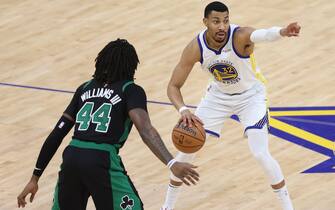 SAN FRANCISCO, CALIFORNIA - JUNE 13: Otto Porter Jr. #32 of the Golden State Warriors sets the play against Robert Williams III #44 of the Boston Celtics during the third quarter in Game Five of the 2022 NBA Finals at Chase Center on June 13, 2022 in San Francisco, California. NOTE TO USER: User expressly acknowledges and agrees that, by downloading and/or using this photograph, User is consenting to the terms and conditions of the Getty Images License Agreement. (Photo by Lachlan Cunningham/Getty Images)