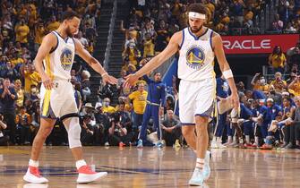 SAN FRANCISCO, CA - JUNE 13: Stephen Curry #30 and Klay Thompson #11 of the Golden State Warriors high five during Game Five of the 2022 NBA Finals on June 13, 2022 at Chase Center in San Francisco, California. NOTE TO USER: User expressly acknowledges and agrees that, by downloading and or using this photograph, user is consenting to the terms and conditions of Getty Images License Agreement. Mandatory Copyright Notice: Copyright 2022 NBAE (Photo by Nathaniel S. Butler/NBAE via Getty Images)