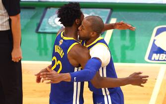 BOSTON, MASSACHUSETTS - JUNE 16: Andrew Wiggins #22 and Andre Iguodala #9 of the Golden State Warriors celebrate against the Boston Celtics during the fourth quarter in Game Six of the 2022 NBA Finals at TD Garden on June 16, 2022 in Boston, Massachusetts. NOTE TO USER: User expressly acknowledges and agrees that, by downloading and/or using this photograph, User is consenting to the terms and conditions of the Getty Images License Agreement. (Photo by Adam Glanzman/Getty Images)