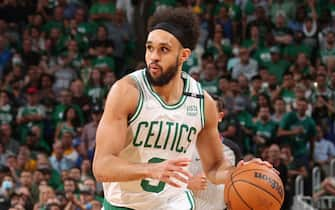 BOSTON, MA - JUNE 16: Derrick White #9 of the Boston Celtics dribbles the ball against the Golden State Warriors during Game Six of the 2022 NBA Finals on June 16, 2022 at TD Garden in Boston, Massachusetts. NOTE TO USER: User expressly acknowledges and agrees that, by downloading and or using this photograph, user is consenting to the terms and conditions of Getty Images License Agreement. Mandatory Copyright Notice: Copyright 2022 NBAE (Photo by Nathaniel S. Butler/NBAE via Getty Images)