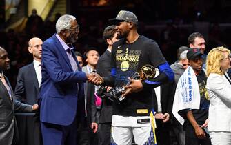 CLEVELAND, OH - JUNE 8: Bill Russell exchanges handshakes with Kevin Durant #35 of the Golden State Warriors after Durant received the Bill Russell Finals MBP Trophy by defeating the Cleveland Cavaliers in Game Four of the 2018 NBA Finals on June 8, 2018 at Quicken Loans Arena in Cleveland, Ohio. NOTE TO USER: User expressly acknowledges and agrees that, by downloading and/or using this Photograph, user is consenting to the terms and conditions of the Getty Images License Agreement. Mandatory Copyright Notice: Copyright 2018 NBAE (Photo by Jesse D. Garrabrant/NBAE via Getty Images)