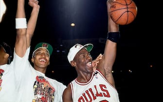 CHICAGO - JUNE 14:  Michael Jordan #23 and teammate Scottie Pippen #33 of the Chicago Bulls celebrate after defeating the Portland Trail Blazers in Game six to win the NBA Championship at Chicago Stadium on June 14, 1992 in Chicago, Illinois.  NOTE TO USER: User expressly acknowledges and agrees that, by downloading and/or using this Photograph, user is consenting to the terms and conditions of the Getty Images License Agreement.  Mandatory Copyright Notice:  Copyright 1992 NBAE  (Photo by Nathaniel S. Butler/NBAE via Getty Images)