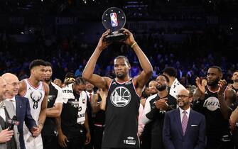 CHARLOTTE, NORTH CAROLINA - FEBRUARY 17:  Kevin Durant #35 of the Golden State Warriors and Team LeBron celebrates with the MVP trophy after their 178-164 win over Team Giannis during the NBA All-Star game as part of the 2019 NBA All-Star Weekend at Spectrum Center on February 17, 2019 in Charlotte, North Carolina. NOTE TO USER: User expressly acknowledges and agrees that, by downloading and/or using this photograph, user is consenting to the terms and conditions of the Getty Images License Agreement. (Photo by Streeter Lecka/Getty Images)