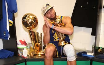 BOSTON, MA - JUNE 16: Stephen Curry #30 of the Golden State Warriors celebrates with the Bill Russell NBA Finals MVP Award after Game Six of the 2022 NBA Finals on June 16, 2022 at TD Garden in Boston, Massachusetts. NOTE TO USER: User expressly acknowledges and agrees that, by downloading and or using this photograph, user is consenting to the terms and conditions of Getty Images License Agreement. Mandatory Copyright Notice: Copyright 2022 NBAE (Photo by Nathaniel S. Butler/NBAE via Getty Images)