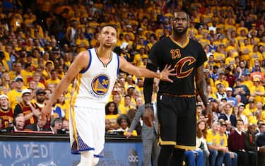 OAKLAND, CA - JUNE 19:  Stephen Curry #30 of the Golden State Warriors and LeBron James #23 of the Cleveland Cavaliers during the game in Game Seven of the 2016 NBA Finals on June 19, 2016 at Oracle Arena in Oakland, California. NOTE TO USER: User expressly acknowledges and agrees that, by downloading and or using this photograph, user is consenting to the terms and conditions of Getty Images License Agreement. Mandatory Copyright Notice: Copyright 2016 NBAE (Photo by Nathaniel S. Butler/NBAE via Getty Images)