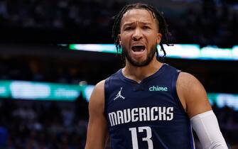 DALLAS, TEXAS - MAY 12: Jalen Brunson #13 of the Dallas Mavericks reacts against the Phoenix Suns in the fourth quarter of Game Six of the 2022 NBA Playoffs Western Conference Semifinals at American Airlines Center on May 12, 2022 in Dallas, Texas. NOTE TO USER: User expressly acknowledges and agrees that, by downloading and/or using this photograph, User is consenting to the terms and conditions of the Getty Images License Agreement. (Photo by Ron Jenkins/Getty Images)