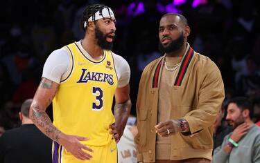 LOS ANGELES, CALIFORNIA - NOVEMBER 08: Anthony Davis #3 and LeBron James #6 of the Los Angeles Lakers talk after a timeout during a 126-123 Lakers overtime win over the Charlotte Hornets at Staples Center on November 08, 2021 in Los Angeles, California. (Photo by Harry How/Getty Images)  NOTE TO USER: User expressly acknowledges and agrees that, by downloading and/or using this Photograph, user is consenting to the terms and conditions of the Getty Images License Agreement.