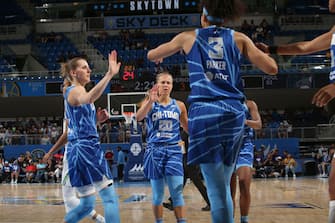 CHICAGO, IL - June 26: The Chicago Sky high fives during the game against the Minnesota Lynx on June 26, 2022 at the Wintrust Arena in Chicago, IL. NOTE TO USER: User expressly acknowledges and agrees that, by downloading and or using this Photograph, user is consenting to the terms and conditions of the Getty Images License Agreement. Mandatory Copyright Notice: Copyright 2022 NBAE (Photo by Gary Dineen/NBAE via Getty Images).