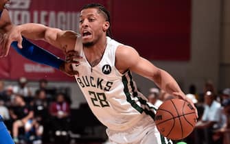 LAS VEGAS, NV - JULY 14:  Lindell Wigginton  #28 of Milwaukee Bucks drives to the basket during the game against the Dallas Mavericks on July 14, 2022 at the Cox Pavilion in Las Vegas, Nevada NOTE TO USER: User expressly acknowledges and agrees that, by downloading and/or using this Photograph, user is consenting to the terms and conditions of the Getty Images License Agreement. Mandatory Copyright Notice: Copyright 2022 NBAE (Photo by David Dow/NBAE via Getty Images)