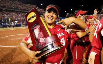 OKLAHOMA CITY, OK - JUNE 09: Jocelyn Alo #78 of the Oklahoma Sooners celebrates with the national championship trophy after the game against the Texas Longhorns during the Division I Women's Softball Championship held at ASA Hall of Fame Stadium on June 9, 2022 in Oklahoma City, Oklahoma. (Photo by C. Morgan Engel/NCAA Photos via Getty Images)