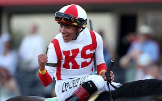 BALTIMORE, MARYLAND - MAY 21: Jockey Jose Ortiz #5 reacts after riding Early Voting to win the 147th Running of the Preakness Stakes at Pimlico Race Course on May 21, 2022 in Baltimore, Maryland. (Photo by Rob Carr/Getty Images)