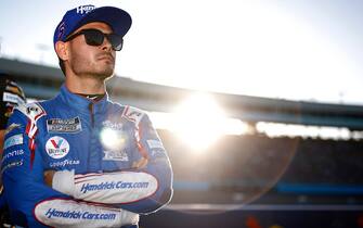 AVONDALE, ARIZONA - NOVEMBER 06: Kyle Larson, driver of the #5 HendrickCars.com Chevrolet, looks on from the grid during qualifying for the NASCAR Cup Series Championship at Phoenix Raceway on November 06, 2021 in Avondale, Arizona. (Photo by Jared C. Tilton/Getty Images)