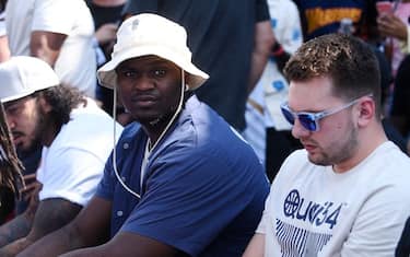 US basketball player Zion Williamson (L) of the New Orleans Pelicans and Slovenian basketball player of the Dallas Mavericks Luka Doncic attends the Quai 54 streetball basketball tournament in Paris, on July 9, 2022. (Photo by JULIEN DE ROSA / AFP) (Photo by JULIEN DE ROSA/AFP via Getty Images)