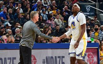 SAN FRANCISCO, CA - APRIL 18: Head Coach Steve Kerr of the Golden State Warriors high fives Kevon Looney #5 of the Golden State Warriors during Round 1 Game 2 of the 2022 NBA Playoffs on April 18, 2022 at Chase Center in San Francisco, California. NOTE TO USER: User expressly acknowledges and agrees that, by downloading and or using this photograph, user is consenting to the terms and conditions of Getty Images License Agreement. Mandatory Copyright Notice: Copyright 2022 NBAE (Photo by Noah Graham/NBAE via Getty Images)