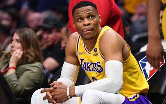 LOS ANGELES, CA - MARCH 03: Los Angeles Lakers Guard Russell Westbrook (0) looks on from the bench during a NBA game between the Los Angeles Lakers and the Los Angeles Clippers on March 3, 2022 at Crypto.com Arena in Los Angeles, CA. (Photo by Brian Rothmuller/Icon Sportswire via Getty Images)