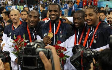 (L to R) USA's Jason Kidd, USA's Kobe Bryant, USA's LeBron James, USA's Dwyane Wade and USA's Carmelo Anthony pose with their medals after the men's basketball gold medal match of the Beijing 2008 Olympic Games on August 24, 2008 at the Olympic basketball Arena in Beijing. The United States won the Olympic men's basketball gold medal defeating Spain 118-107. Argentina defeated Lithuania 87-75 in the bronze-medal game.   AFP PHOTO / THOMAS COEX (Photo credit should read THOMAS COEX/AFP via Getty Images)
