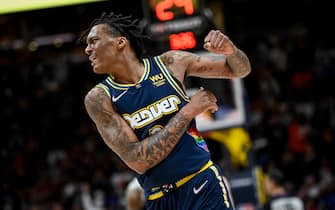 DENVER, CO - APRIL 24: Bones Hyland (3) of the Denver Nuggets celebrates after putting Klay Thompson (11) of the Golden State Warriors on an island and cooking him for an easy layup during the fourth quarter of Denver's 126-121 win at Ball Arena on Sunday, April 24, 2022. The best-of-seven first round NBA playoffs series is now 3-1 in favor of Golden State ahead of Wednesday's game five in San Francisco. (Photo by AAron Ontiveroz/MediaNews Group/The Denver Post via Getty Images)