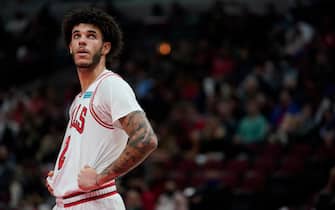 CHICAGO, ILLINOIS - OCTOBER 15: Lonzo Ball #2 of the Chicago Bulls looks on against the Memphis Grizzlies in the first half during a preseason game at United Center on October 15, 2021 in Chicago, Illinois. NOTE TO USER: User expressly acknowledges and agrees that, by downloading and or using this photograph, user is consenting to the terms and conditions of the Getty Images License Agreement. (Photo by Patrick McDermott/Getty Images)