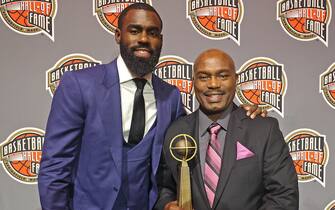 SPRINGFIELD, MA - SEPTEMBER 10: Inductee, Tim Hardaway poses for a portrait with his son Tim Hardaway Jr. and the Hall of Fame Trophy during the 2022 Basketball Hall of Fame Enshrinement Ceremony on September 10, 2022 at Symphony Hall in Springfield, Massachusetts. NOTE TO USER: User expressly acknowledges and agrees that, by downloading and/or using this photograph, user is consenting to the terms and conditions of the Getty Images License Agreement. Mandatory Copyright Notice: Copyright 2022 NBAE (Photo by Nathaniel S. Butler/NBAE via Getty Images)