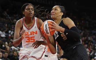 LAS VEGAS, NEVADA - JUNE 02: A'ja Wilson #22 of the Las Vegas Aces drives to the basket against Jonquel Jones #35 of the Connecticut Sun during their game at Michelob ULTRA Arena on June 02, 2022 in Las Vegas, Nevada. The Sun defeated the Aces 97-90. NOTE TO USER: User expressly acknowledges and agrees that, by downloading and or using this photograph, User is consenting to the terms and conditions of the Getty Images License Agreement. (Photo by Ethan Miller/Getty Images)