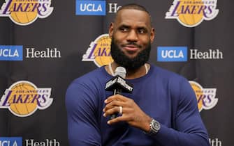 LAS VEGAS, NEVADA - OCTOBER 05: LeBron James #6 of the Los Angeles Lakers smiles during a news conference after a preseason game against the Phoenix Suns at T-Mobile Arena on October 05, 2022 in Las Vegas, Nevada. The Suns defeated the Lakers 119-115. NOTE TO USER: User expressly acknowledges and agrees that, by downloading and or using this photograph, User is consenting to the terms and conditions of the Getty Images License Agreement. (Photo by Ethan Miller/Getty Images)