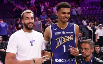 HENDERSON, NEVADA - OCTOBER 06: Rudy Gobert, (L) a French NBA player for the Minnesota Timberwolves, poses next to Victor Wembanyama #1 of Boulogne-Levallois Metropolitans 92 after an exhibition game against G League Ignite at The Dollar Loan Center on October 06, 2022 in Henderson, Nevada. NOTE TO USER: User expressly acknowledges and agrees that, by downloading and or using this photograph, User is consenting to the terms and conditions of the Getty Images License Agreement.  (Photo by Steve Marcus/Getty Images)
