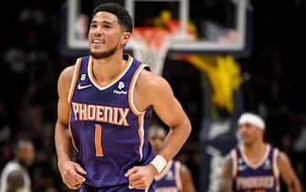 DENVER, CO - OCTOBER 10: Devin Booker (1) of the Phoenix Suns reacts to being locked down by Christian Braun (0) of the Denver Nuggets during the third quarter on Monday, October 10, 2022. (Photo by AAron Ontiveroz/MediaNews Group/The Denver Post via Getty Images)