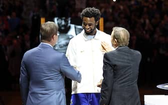 SAN FRANCISCO, CALIFORNIA - OCTOBER 18:  Andrew Wiggins #22 of the Golden State Warriors receives his Championship ring from team owners Joe Lacob and Peter Guber during a ceremony prior to the game against the Los Angeles Lakers at Chase Center on October 18, 2022 in San Francisco, California. NOTE TO USER: User expressly acknowledges and agrees that, by downloading and or using this photograph, User is consenting to the terms and conditions of the Getty Images License Agreement. (Photo by Ezra Shaw/Getty Images)