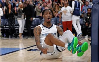 MEMPHIS, TENNESSEE - OCTOBER 19: Ja Morant #12 of the Memphis Grizzlies reacts during the game against the New York Knicks at FedExForum on October 19, 2022 in Memphis, Tennessee. NOTE TO USER: User expressly acknowledges and agrees that, by downloading and or using this photograph, User is consenting to the terms and conditions of the Getty Images License Agreement. (Photo by Justin Ford/Getty Images)