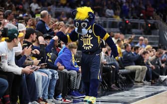 INDIANAPOLIS, INDIANA - DECEMBER 13:  Indiana Pacers mascot with fans against the Golden State Warriors at Gainbridge Fieldhouse on December 13, 2021 in Indianapolis, Indiana.    NOTE TO USER: User expressly acknowledges and agrees that, by downloading and or using this Photograph, user is consenting to the terms and conditions of the Getty Images License Agreement.  (Photo by Andy Lyons/Getty Images)