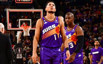 PHOENIX, AZ - OCTOBER 25 Devin Booker #1 of the Phoenix Suns looks on during the game against the Golden State Warriors on October 25 2022 at Footprint Center in Phoenix, Arizona. NOTE TO USER: User expressly acknowledges and agrees that, by downloading and or using this photograph, user is consenting to the terms and conditions of the Getty Images License Agreement. Mandatory Copyright Notice: Copyright 2022 NBAE (Photo by Kate Frese/NBAE via Getty Images)