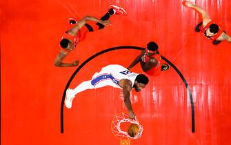 TORONTO, CANADA - OCTOBER 26: Joel Embiid #21 of the Philadelphia 76ers dunks the ball against the Toronto Raptors on October 26, 2022 at the Scotiabank Arena in Toronto, Ontario, Canada. NOTE TO USER: User expressly acknowledges and agrees that, by downloading and or using this Photograph, user is consenting to the terms and conditions of the Getty Images License Agreement. Mandatory Copyright Notice: Copyright 2022 NBAE (Photo by Vaughn Ridley/NBAE via Getty Images)