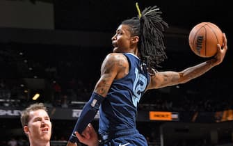SAN ANTONIO, TX - NOVEMBER 9: Ja Morant #12 of the Memphis Grizzlies drives to the basket against the San Antonio Spurs on November 9, 2022 at the AT&T Center in San Antonio, Texas. NOTE TO USER: User expressly acknowledges and agrees that, by downloading and or using this photograph, user is consenting to the terms and conditions of the Getty Images License Agreement. Mandatory Copyright Notice: Copyright 2022 NBAE (Photos by Michael Gonzales/NBAE via Getty Images)