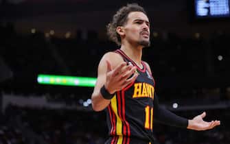 HOUSTON, TEXAS - NOVEMBER 25: Trae Young #11 of the Atlanta Hawks reacts during the first half against the Houston Rockets at Toyota Center on November 25, 2022 in Houston, Texas. NOTE TO USER: User expressly acknowledges and agrees that, by downloading and or using this photograph, User is consenting to the terms and conditions of the Getty Images License Agreement. (Photo by Carmen Mandato/Getty Images)