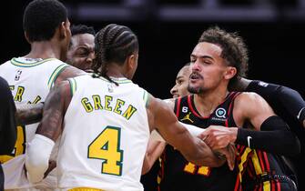 HOUSTON, TEXAS - NOVEMBER 25: Dejounte Murray #5 and Trae Young #11 of the Atlanta Hawks get into an altercation with Jalen Green #4 and Jabari Smith Jr. #1 of the Houston Rockets during the second half at Toyota Center on November 25, 2022 in Houston, Texas. NOTE TO USER: User expressly acknowledges and agrees that, by downloading and or using this photograph, User is consenting to the terms and conditions of the Getty Images License Agreement. (Photo by Carmen Mandato/Getty Images)