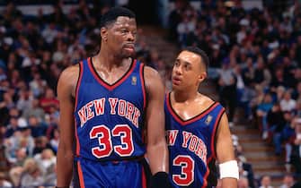 SACRAMENTO, CA - FEBRUARY 20: Patrick Ewing #33 and John Starks #3 of the New York Knicks talk against the Sacramento Kings on February 20, 1997 at Arco Arena in Sacramento, California. NOTE TO USER: User expressly acknowledges and agrees that, by downloading and or using this photograph, User is consenting to the terms and conditions of the Getty Images License Agreement. Mandatory Copyright Notice: Copyright 1997 NBAE (Photo by Rocky Widner/NBAE via Getty Images)