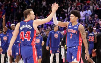 DETROIT, MI - DECEMBER 1: Bojan Bogdanovic #44 of the Detroit Pistons high fives Killian Hayes #7 of the Detroit Pistons after the game against the Dallas Mavericks  on December 1, 2022 at Little Caesars Arena in Detroit, Michigan. NOTE TO USER: User expressly acknowledges and agrees that, by downloading and/or using this photograph, User is consenting to the terms and conditions of the Getty Images License Agreement. Mandatory Copyright Notice: Copyright 2022 NBAE (Photo by Brian Sevald/NBAE via Getty Images)