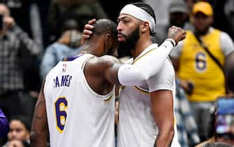 WASHINGTON, DC - DECEMBER 04: Anthony Davis #3 and LeBron James #6 of the Los Angeles Lakers celebrate after a 130-119 victory against the Washington Wizards at Capital One Arena on December 04, 2022 in Washington, DC. NOTE TO USER: User expressly acknowledges and agrees that, by downloading and or using this photograph, User is consenting to the terms and conditions of the Getty Images License Agreement.  (Photo by Greg Fiume/Getty Images)
