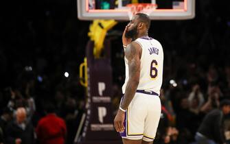 LOS ANGELES, CALIFORNIA - DECEMBER 18: LeBron James #6 of the Los Angeles Lakers blows a kiss to the crowd after defeating the Washington Wizards at Crypto.com Arena on December 18, 2022 in Los Angeles, California. NOTE TO USER: User expressly acknowledges and agrees that, by downloading and or using this photograph, User is consenting to the terms and conditions of the Getty Images License Agreement. (Photo by Meg Oliphant/Getty Images)