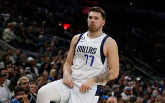 SAN ANTONIO, TX - DECEMBER 31: Luka Doncic #77 of the Dallas Mavericks does a little dance after hitting a three against the San Antonio Spurs in the first half at AT&T Center on December 31, 2022 in San Antonio, Texas. NOTE TO USER: User expressly acknowledges and agrees that, by downloading and or using this photograph, User is consenting to terms and conditions of the Getty Images License Agreement. (Photo by Ronald Cortes/Getty Images)