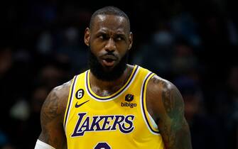 CHARLOTTE, NORTH CAROLINA - JANUARY 02: LeBron James #6 of the Los Angeles Lakers reacts following a dunk during the second half of the game against the Charlotte Hornets at Spectrum Center on January 02, 2023 in Charlotte, North Carolina. NOTE TO USER: User expressly acknowledges and agrees that, by downloading and or using this photograph, User is consenting to the terms and conditions of the Getty Images License Agreement. (Photo by Jared C. Tilton/Getty Images)