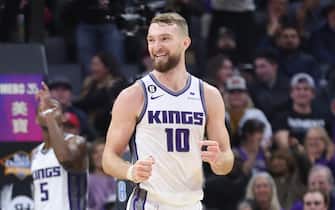 SACRAMENTO, CALIFORNIA - JANUARY 20: Domantas Sabonis #10 of the Sacramento Kings celebrates after a basket in the fourth quarter against the Oklahoma City Thunder at Golden 1 Center on January 20, 2023 in Sacramento, California. NOTE TO USER: User expressly acknowledges and agrees that, by downloading and/or using this photograph, User is consenting to the terms and conditions of the Getty Images License Agreement. (Photo by Lachlan Cunningham/Getty Images)