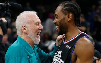 SAN ANTONIO, TX - JANUARY 20: Head coach Gregg Popovich of the San Antonio Spurs greets Kawhi Leonard #2 of the Los Angeles Clippers at the end of the game at AT&T Center on January 20, 2023 in San Antonio, Texas. NOTE TO USER: User expressly acknowledges and agrees that, by downloading and or using this photograph, User is consenting to terms and conditions of the Getty Images License Agreement. (Photo by Ronald Cortes/Getty Images)