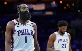 PHILADELPHIA, PA - JANUARY 28: James Harden #1 and Joel Embiid #21 of the Philadelphia 76ers look on against the Denver Nuggets at the Wells Fargo Center on January 28, 2023 in Philadelphia, Pennsylvania. NOTE TO USER: User expressly acknowledges and agrees that, by downloading and or using this photograph, User is consenting to the terms and conditions of the Getty Images License Agreement. (Photo by Mitchell Leff/Getty Images)