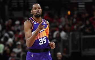 CHICAGO, ILLINOIS - MARCH 03: Kevin Durant #35 of the Phoenix Suns reacts after scoring in the second half against the Chicago Bulls at United Center on March 03, 2023 in Chicago, Illinois.  NOTE TO USER: User expressly acknowledges and agrees that, by downloading and or using this photograph, User is consenting to the terms and conditions of the Getty Images License Agreement.  (Photo by Quinn Harris/Getty Images)