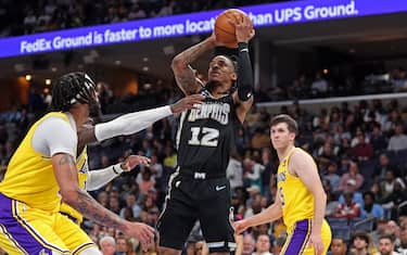 MEMPHIS, TENNESSEE - FEBRUARY 28: Ja Morant #12 of the Memphis Grizzlies takes a shot during the first half against the Los Angeles Lakers at FedExForum on February 28, 2023 in Memphis, Tennessee. NOTE TO USER: User expressly acknowledges and agrees that, by downloading and or using this photograph, User is consenting to the terms and conditions of the Getty Images License Agreement. (Photo by Justin Ford/Getty Images)